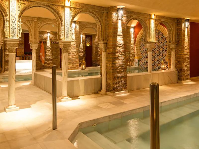 Arches, columns and warm pools at Hammam Palacio Nazarí in Granada